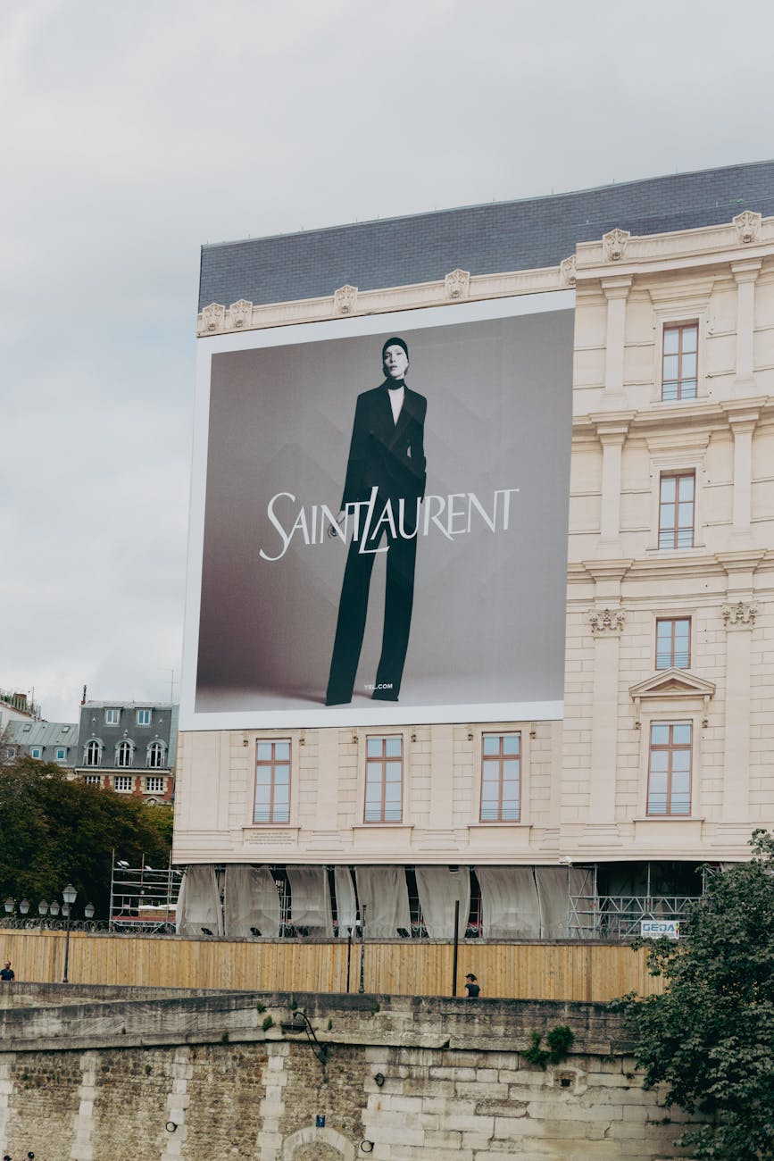 a billboard advertising a man in a suit on a building