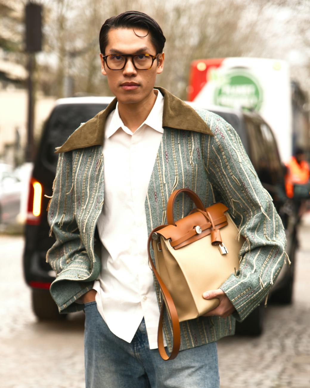 stylish male model walking the streets of paris