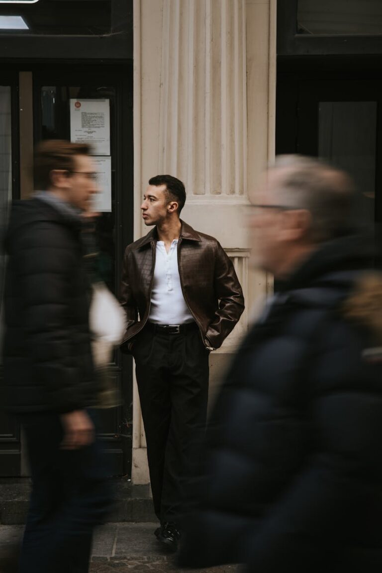 man in leather jacket on street in lille