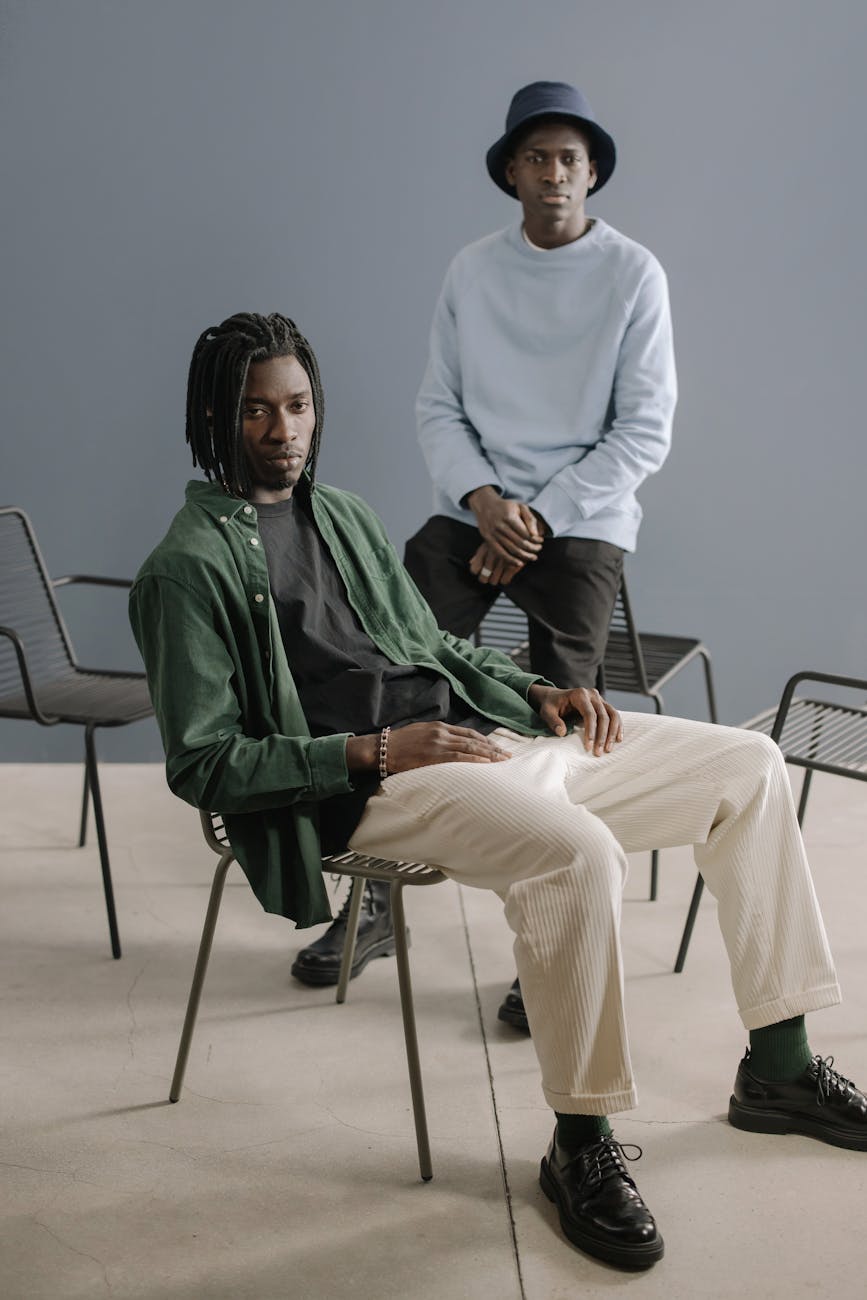 men sitting on chairs